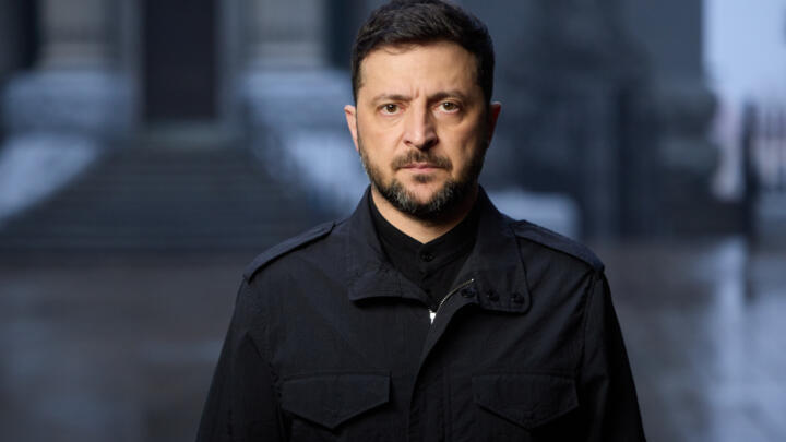 In this photo provided by the Press Service Of The President Of Ukraine on Nov. 21, 2025, Ukraine's President Volodymyr Zelensky looks into the camera while delivering a video address to the nation.