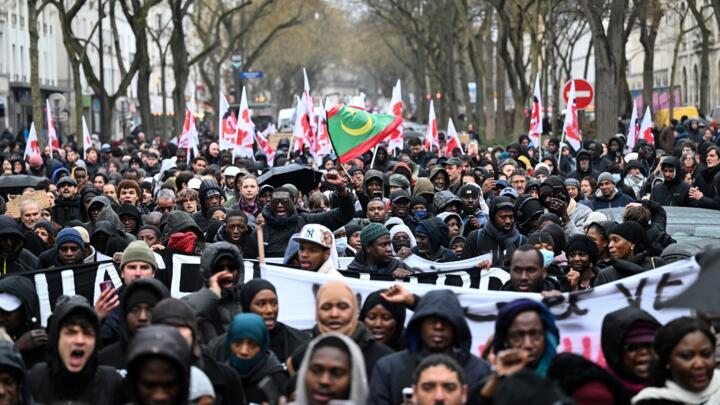 Thousands protest in Paris over death of migrant worker
