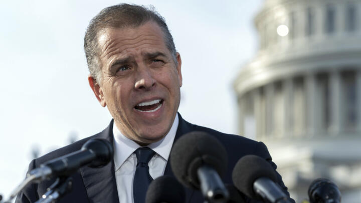 Hunter Biden, son of President Joe Biden, talks to reporters at the US Capitol, in Washington, December 13, 2023.