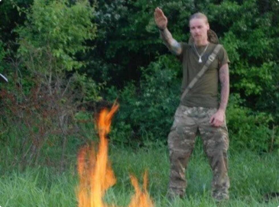 Here is a photo of Yan Petrovsky performing a Nazi salute, published by the Ukrainian investigative group, Molfar.