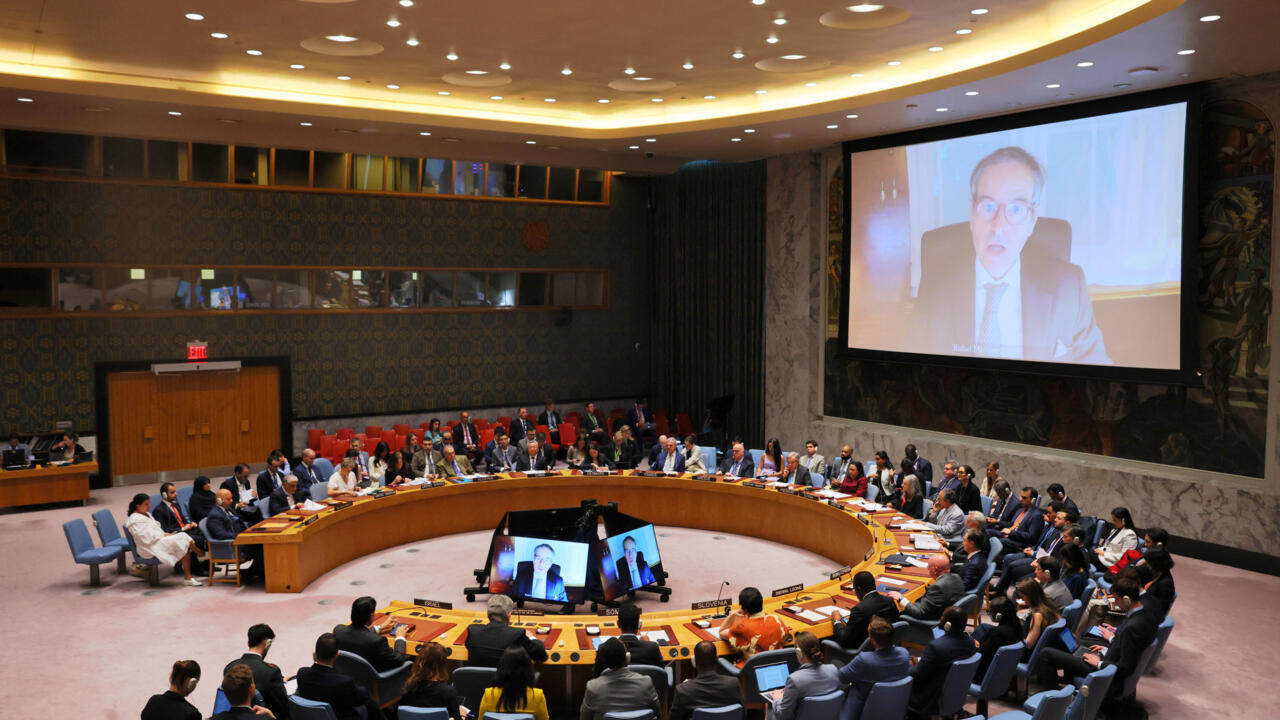 Members of the United Nations Security Council listen Rafael Grossi, Director General of the International Atomic Energy Agency, speaking via video.