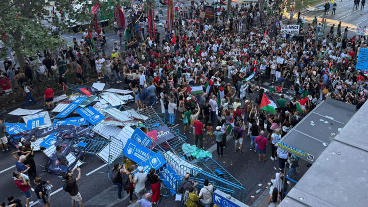 Pro-Palestinian protesters invade the course of the 21st and final stage of the Vuelta in Madrid on September 14, 2025.