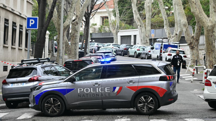 A French National Police car blocks off a street in front of the Russian consulate in Marseille, after three improvised explosive devices were thrown, on February 24, 2025.