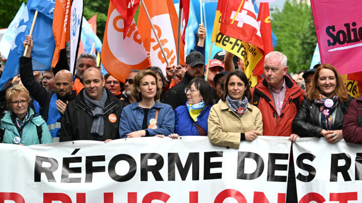 Outgoing French Democratic Confederation of Labour (CFDT) union's general secretary Laurent Berger (2L), soon-to-be acting CFDT leader leader Marylise Leon (CL), French CGT trade union General Secretary Sophie Binet (CR), French Solidaires trade union co general delegate Murielle Guilbert (R) take part in a demonstration on May Day (Labour Day), to mark the international day of the workers, more than a month after the government pushed an unpopular pensions reform act through parliament, in Paris, on May 1, 2023.