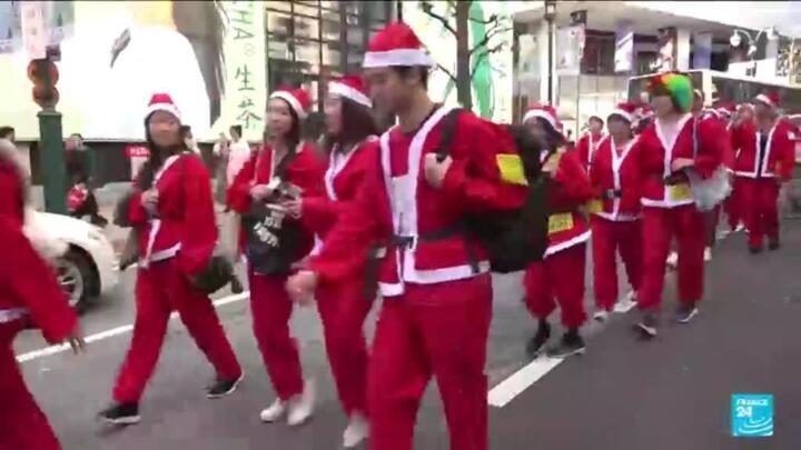 Thousands join Santa Claus parade in Tokyo to support children in need