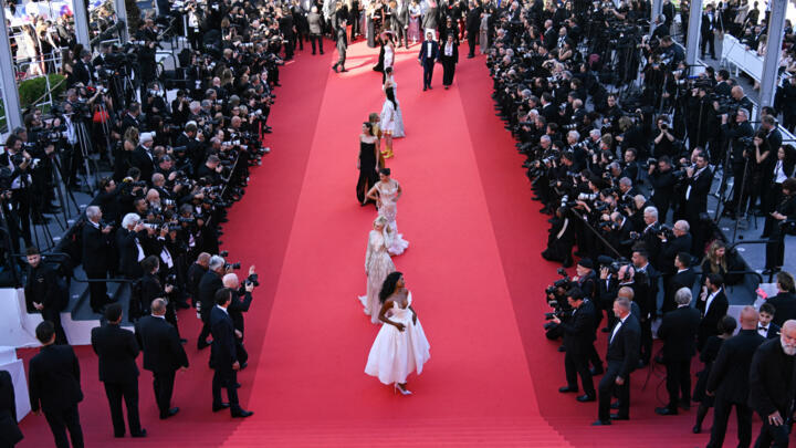 British actress Simone Ashley, US actress Elle Fanning and guests arrive for the screening of the film "The Mastermind" at the Cannes Film Festival on May 23, 2025.