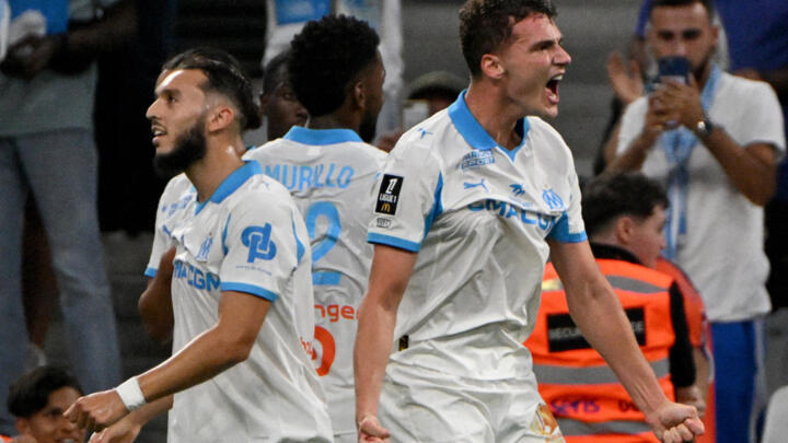 Marseille's French defender #28 Benjamin Pavard celebrates scoring his team's second goal during the French L1 football match between Olympique de Marseille (OM) and FC Lorient.
