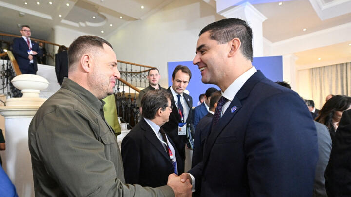 Malta's foreign minister Ian Borg meets a delegate during the weekend meeting organised by Ukraine to discuss its peace formula for ending the war with Russia, being held behind closed doors in an unnamed hotel in St Julian's, Malta on October 28, 2023. 