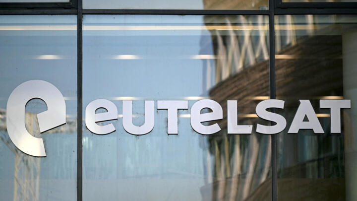 A photograph showing the Eutelsat's logo displayed on its headquarters in Issy-les-Moulineaux, southwest of Paris, on June 19, 2025.