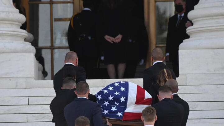 The flag-draped casket of the late US Supreme Court Justice Ruth Bader Ginsburg arrives at the Supreme Court in Washington, DC, on September 23, 2020.