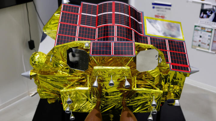A miniature model of the Smart Lander for Investigating Moon (SLIM) is displayed at Japan Aerospace Exploration Agency (JAXA)'s facility in Sagamihara, Japan, January 19, 2024.