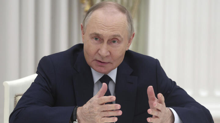 Russian President Vladimir Putin gestures during a meeting in Moscow on April 16, 2025.