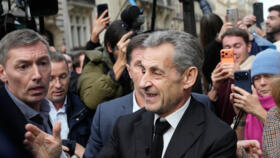 Former French President Nicolas Sarkozy arrives to sign his book "Diary of a Prisoner," in a Paris bookshop, December 10, 2025