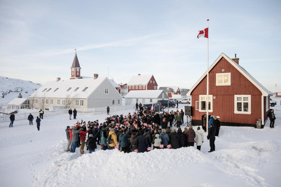 Members of the Canadian diaspora gather in front of the Canadian consulate after its official opening in Nuuk, Greenland.