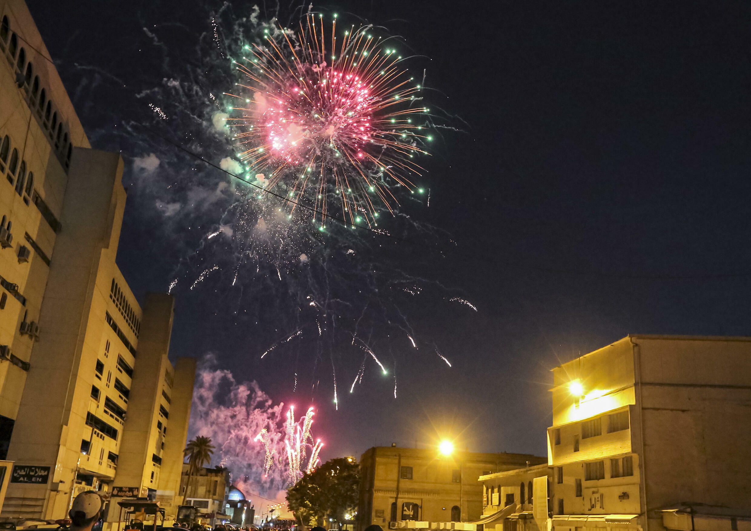 Fireworks lit the sky during the reopening of the renovated street