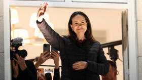 Nobel Peace Prize laureate Maria Corina Machado waves from a balcony of Grand Hotel, after her daughter Ana Corina Sosa Machado, accepted the award on her behalf, in Oslo, Norway December 11, 2025.