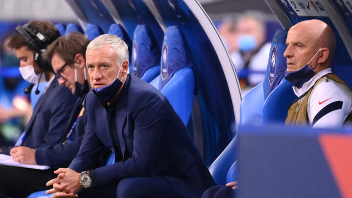 France's coach Didier Deschamps (L) talks with France's assistant coach Guy Stephan during the friendly football match France vs Bulgaria ahead of the Euro 2020 tournament, at Stade De France in Saint-Denis, on the outskirts of Paris on June 8, 2021.