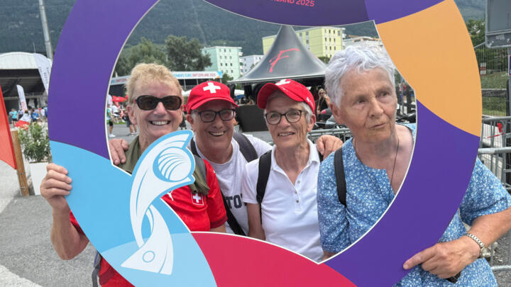 Former Swiss national team players Cathy Moser, Nelly Juillard, Rose-Marie Siggen and Elisabeth Copt pose with a UEFA Women's Soccer Euro sign.