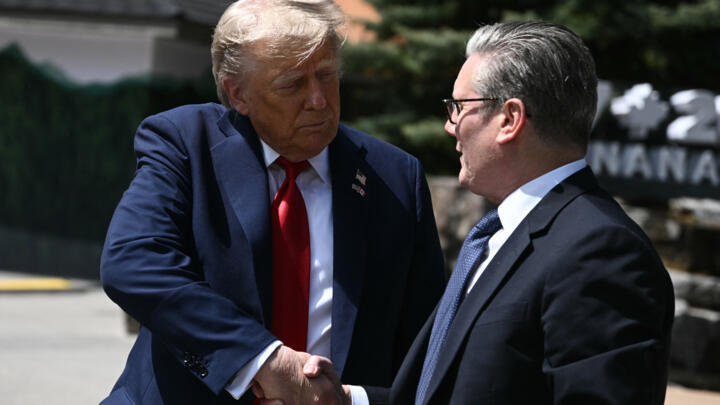 US President Donald Trump and British Prime Minister Keir Starmer during the Group of Seven (G7) Summit at the Pomeroy Kananaskis Mountain Lodge in Kananaskis, Canada on June 16, 2025.