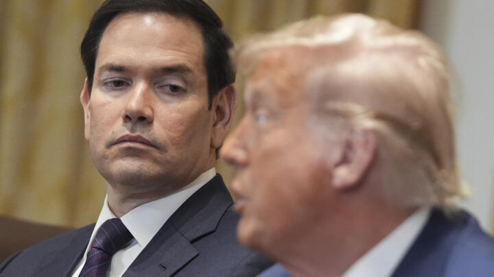 Secretary of State Marco Rubio, left, listens as President Donald Trump speaks during a cabinet meeting at the White House, on July 8, 2025.